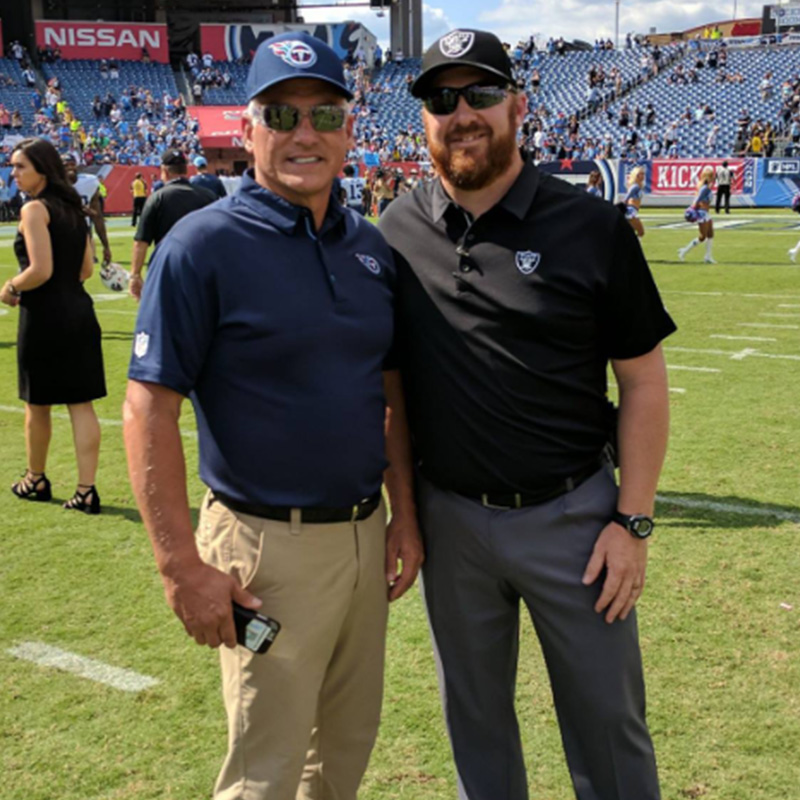 Chuck and Friend on Football Field